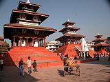 Manaslu 00 12 Kathmandu Durbar Square Trailokya Mohan, Maju Deval and Narayan Temples Kathmandu�s Durbar Square is a complex of beautiful Hindu temples and shrines built in the 16th and 17th centuries in pagoda style embellished with intricately carved exteriors. Shining in the early morning sun at Kathmandu�s Durbar Square are Trailokya Mohan, Maju Deval and Narayan Temples. Built in 1690, Trailokya Mohan stands on a five-stage plinth with three roofs and is dedicated to Vishnu. Built in the late 17C, Maju Deval has a nine-step brick base. On the far right is Narayan Temple.
